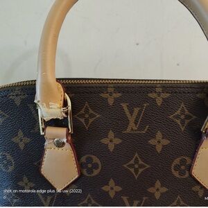 Louis Vuitton bag with lock